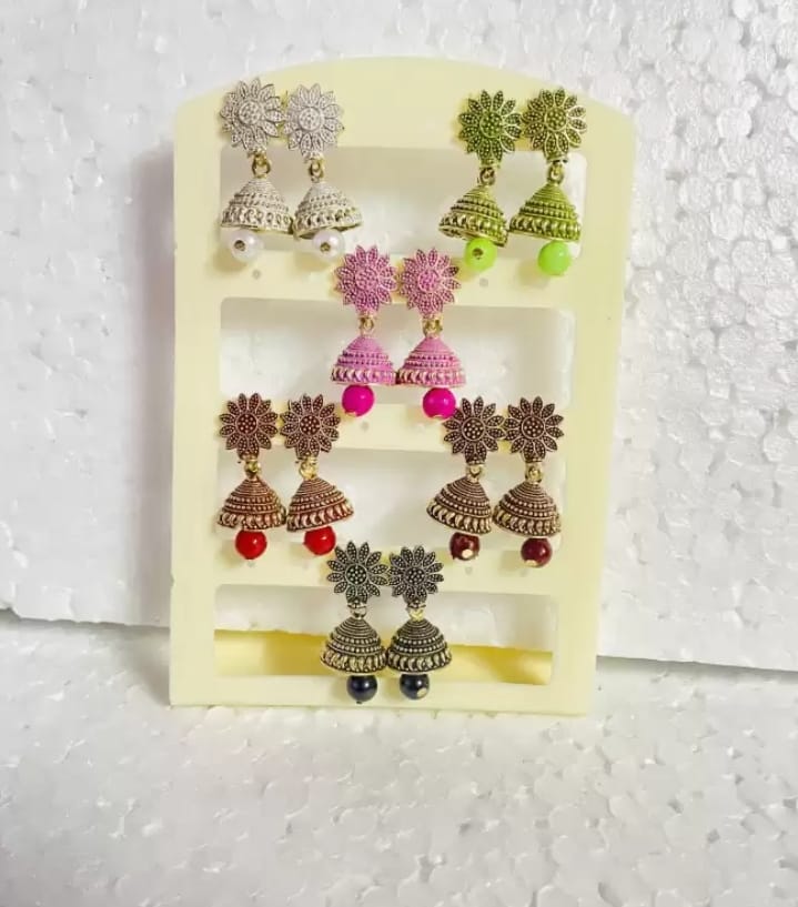 Focus on Whimsy and Unique Designs and colourful earrings 