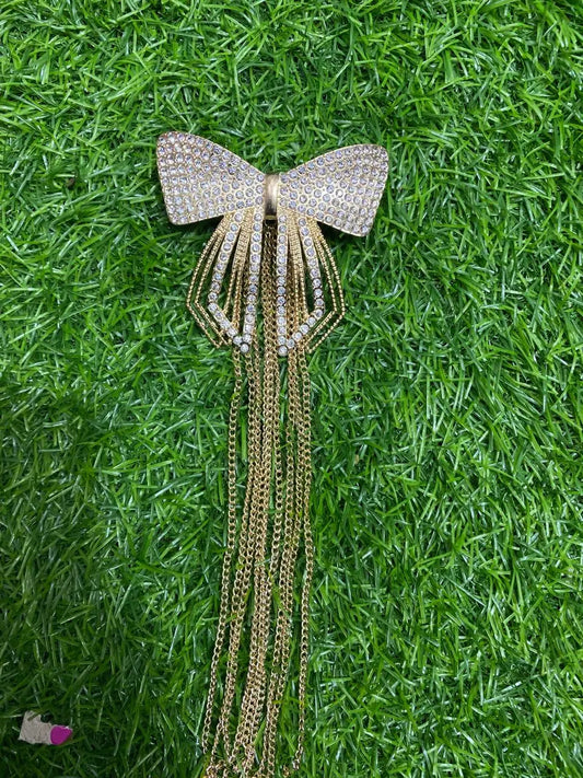 Luxury Crystal Bow Brooch with Gold Chain Tassels – Elegant Statement Jewelry